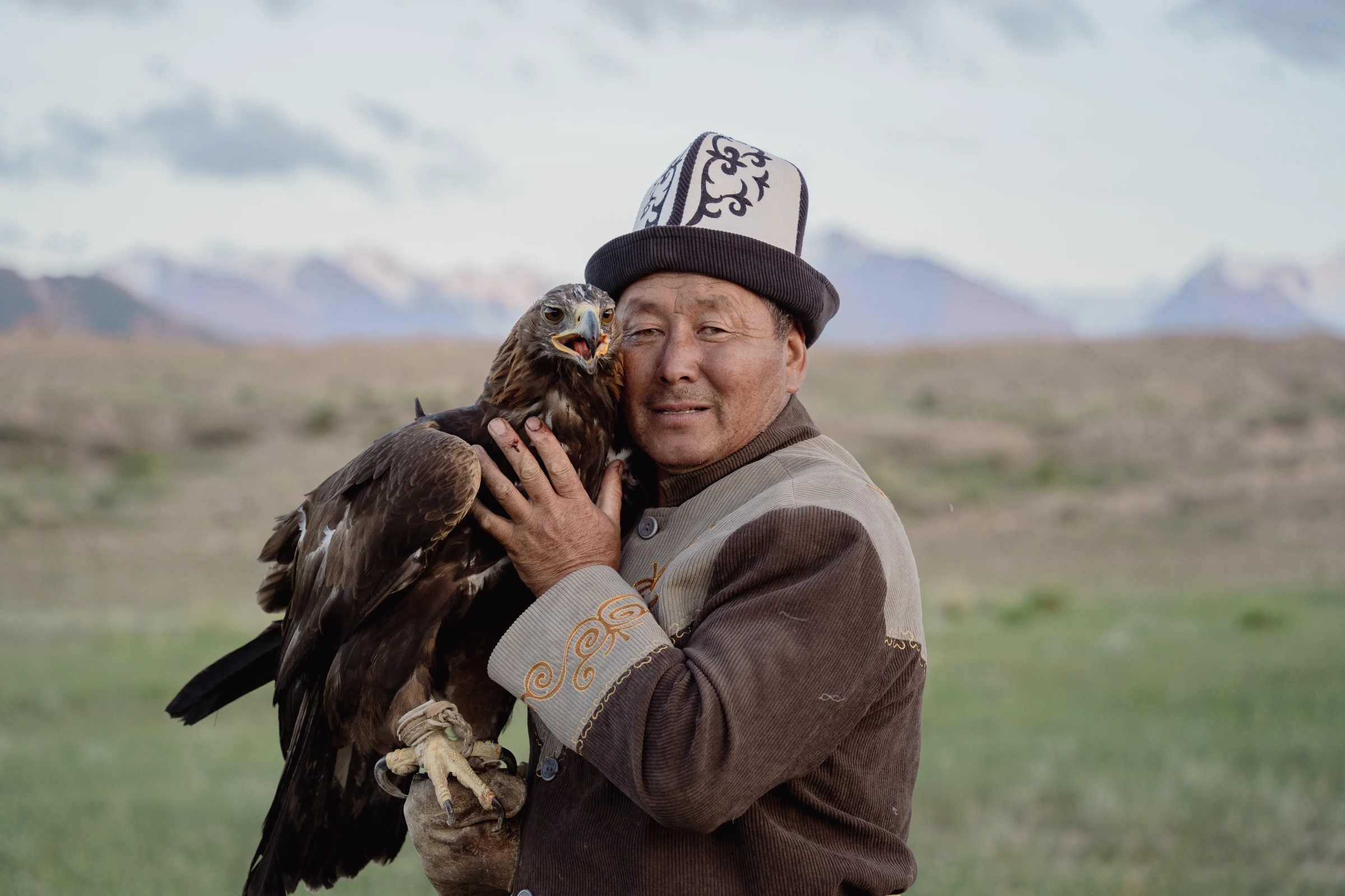 A Kyrgyz Berkutchi with golden eagle